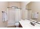 Well-lit bathroom with a shower-tub combo, single sink vanity, and neutral decor at 6202 E Mckellips Rd # 210, Mesa, AZ 85215