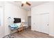 Bright bedroom with neutral walls, ceiling fan, and a closet at 6202 E Mckellips Rd # 210, Mesa, AZ 85215