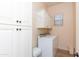 Laundry room with washer and dryer, ample cabinet space, and a window at 6202 E Mckellips Rd # 210, Mesa, AZ 85215