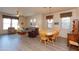 Cozy living room with wood floors, ceiling fan, and lots of natural light at 6202 E Mckellips Rd # 210, Mesa, AZ 85215