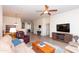 Spacious living room features hardwood floors, ceiling fan, and comfortable seating at 6202 E Mckellips Rd # 210, Mesa, AZ 85215