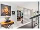 Hallway view featuring the dining room, decorative block wall, and access to other living spaces at 7242 E Joshua Tree Ln, Scottsdale, AZ 85250