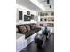 Cozy living room boasts a built-in couch, stylish decor, and modern lighting at 7242 E Joshua Tree Ln, Scottsdale, AZ 85250