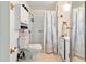 Well-lit bathroom with shower, toilet, and ample storage space at 7807 E Main St # Aa-8, Mesa, AZ 85207
