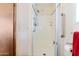 Functional bathroom showcasing a shower with grab bars and essential accessories at 7807 E Main St # Aa-8, Mesa, AZ 85207