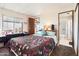 Comfortable bedroom showcasing a doorway to the bathroom at 7807 E Main St # Aa-8, Mesa, AZ 85207