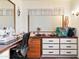 Functional office space with a desk, drawers, and natural light, ideal for productivity at 7807 E Main St # Aa-8, Mesa, AZ 85207