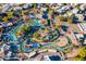Aerial view of the Hilton resort featuring multiple pools, a lazy river, and tennis courts at 7841 N 18Th St, Phoenix, AZ 85020
