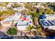 Aerial view of the home in a lush neighborhood, featuring a red tile roof at 7841 N 18Th St, Phoenix, AZ 85020