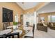 Bright and airy dining area featuring a glass table, modern seating and decor at 7841 N 18Th St, Phoenix, AZ 85020