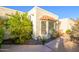 Close up of a beige, single-story home with a tile roof and desert landscaping at 7841 N 18Th St, Phoenix, AZ 85020