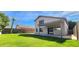 Spacious backyard with a covered patio and well-maintained lawn, perfect for outdoor entertaining at 846 W Straford Ave, Gilbert, AZ 85233