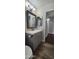 Bathroom featuring updated vanity with framed mirror and new light fixture at 846 W Straford Ave, Gilbert, AZ 85233
