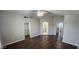 Bedroom features hardwood floors and ensuite bathroom and walk-in closet entrances on opposite sides of the room at 846 W Straford Ave, Gilbert, AZ 85233