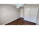 Bedroom features a ceiling fan, wood floors and standard closet at 846 W Straford Ave, Gilbert, AZ 85233