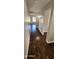 Hallway features hardwood floors leading to other areas of the home at 846 W Straford Ave, Gilbert, AZ 85233