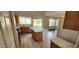 Bright kitchen with tile flooring, modern cabinetry, and an island with a marble countertop at 846 W Straford Ave, Gilbert, AZ 85233