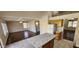 Open floor plan featuring a kitchen with an island and stainless steel appliances that flows into the living area at 846 W Straford Ave, Gilbert, AZ 85233