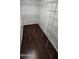 Walk-in closet has hardwood floors with white wire shelving on the walls at 846 W Straford Ave, Gilbert, AZ 85233
