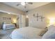 Inviting primary bedroom with mirrored closet doors, neutral colors, and decorative wall art at 1027 W Julie Dr, Tempe, AZ 85283