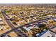 An aerial view showcasing a nice community in an open area at 10521 W Roundelay Cir, Sun City, AZ 85351