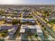 An aerial view showcasing a nice community in an open area at 10521 W Roundelay Cir, Sun City, AZ 85351