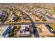 A nice neighborhood featuring single-Gathering homes, well-maintained streets, and desert landscaping at 10521 W Roundelay Cir, Sun City, AZ 85351