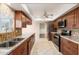 Kitchen with stainless steel appliances, granite countertops, and tile flooring at 10521 W Roundelay Cir, Sun City, AZ 85351