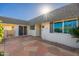 Exterior patio with tiled flooring and gated access at 10521 W Roundelay Cir, Sun City, AZ 85351