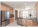 Bright kitchen showcasing a large island, modern appliances, and ample cabinet space at 10649 E Lomita Ave, Mesa, AZ 85209