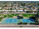 Beautiful aerial view of community with tennis courts, green spaces, and mature landscaping in a vibrant neighborhood at 10834 N 45Th St, Phoenix, AZ 85028