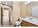 This bathroom features a vanity with a white countertop, toilet, and vinyl flooring at 11201 W Elm Ln, Avondale, AZ 85323