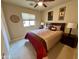 Cozy bedroom with carpet, warm colors, and decorative wall art at 1203 W Mesquite Tree Ln, San Tan Valley, AZ 85143