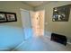 Hallway view featuring framed artwork and a storage bench at 1203 W Mesquite Tree Ln, San Tan Valley, AZ 85143