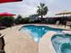 Enjoy the sparkling pool and spa complete with desert landscaping, and private patio at 1203 W Mesquite Tree Ln, San Tan Valley, AZ 85143