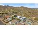 Aerial view of a neighborhood nestled against a mountain backdrop at 15025 E Ridgeway Dr, Fountain Hills, AZ 85268