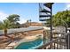 Spiral staircase leading to backyard pool and spa area at 15025 E Ridgeway Dr, Fountain Hills, AZ 85268