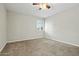 A bedroom with carpet and a ceiling fan and a window with shutters at 15031 N 37Th Ave, Phoenix, AZ 85053