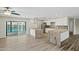 Open kitchen with granite counters, stainless appliances, and a view of the pool at 15031 N 37Th Ave, Phoenix, AZ 85053