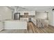 Updated kitchen featuring stainless appliances, stylish backsplash, and ample granite counters at 15031 N 37Th Ave, Phoenix, AZ 85053