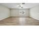 Spacious living room with a ceiling fan and ample natural light at 15031 N 37Th Ave, Phoenix, AZ 85053