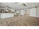 Open floor plan view of the kitchen featuring stainless appliances and an island at 15031 N 37Th Ave, Phoenix, AZ 85053