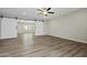 Living room showcasing sliding barn doors that open to an additional living space at 15031 N 37Th Ave, Phoenix, AZ 85053