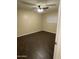 Bedroom featuring wooden flooring, neutral paint colors, and a ceiling fan at 1533 W 7Th St, Tempe, AZ 85281
