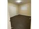 Bedroom with a large window, wooden flooring, and a closet at 1533 W 7Th St, Tempe, AZ 85281