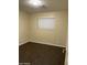 Bedroom features wooden flooring, neutral colors, and ample natural light at 1533 W 7Th St, Tempe, AZ 85281