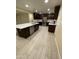 Gorgeous kitchen with custom cabinets, stainless steel appliances, and an island with a breakfast bar at 1533 W 7Th St, Tempe, AZ 85281