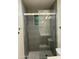 Shower with gray tiling, a glass door, and modern fixtures at 1533 W 7Th St, Tempe, AZ 85281
