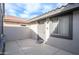 Cozy patio with concrete floor surrounded by stucco walls and a view of the neighborhood at 15655 W Bethesda Ct, Surprise, AZ 85374