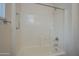 Bright bathroom shower and tub combo with white subway tiles and chrome fixtures at 15655 W Bethesda Ct, Surprise, AZ 85374